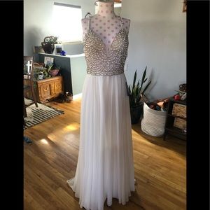 Wedding dress, never worn bc Covid canceled my wedding.